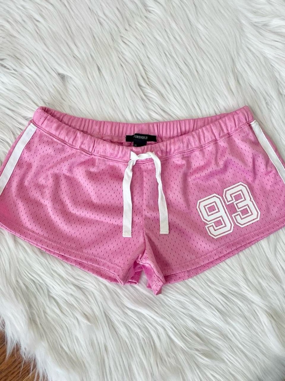 Pink athletic micro mini shorts by Forever 21